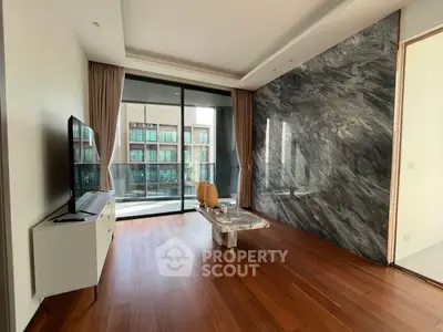Luxurious living room with marble accent wall and balcony view in modern apartment.