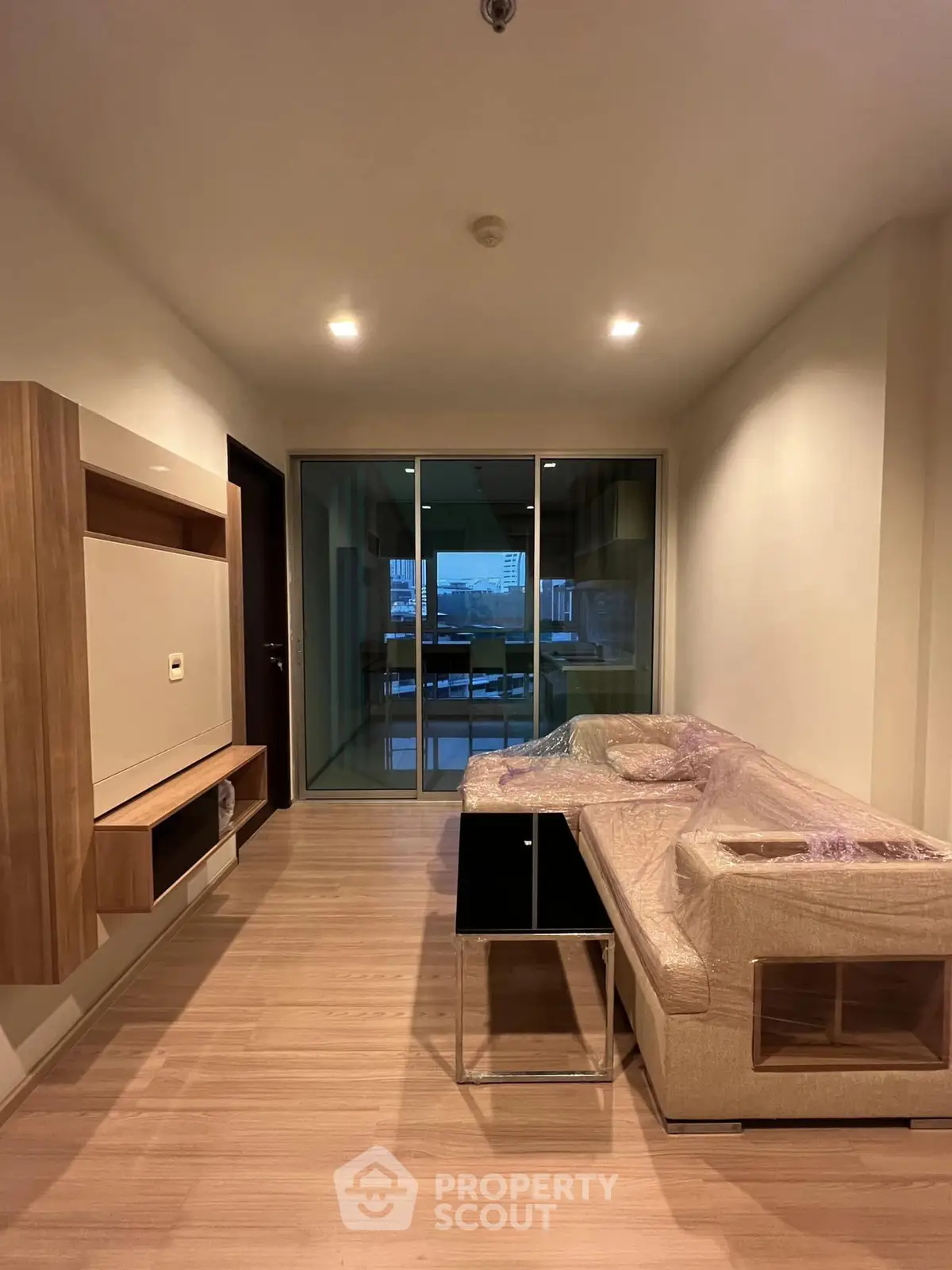 Modern living room with sleek design and city view