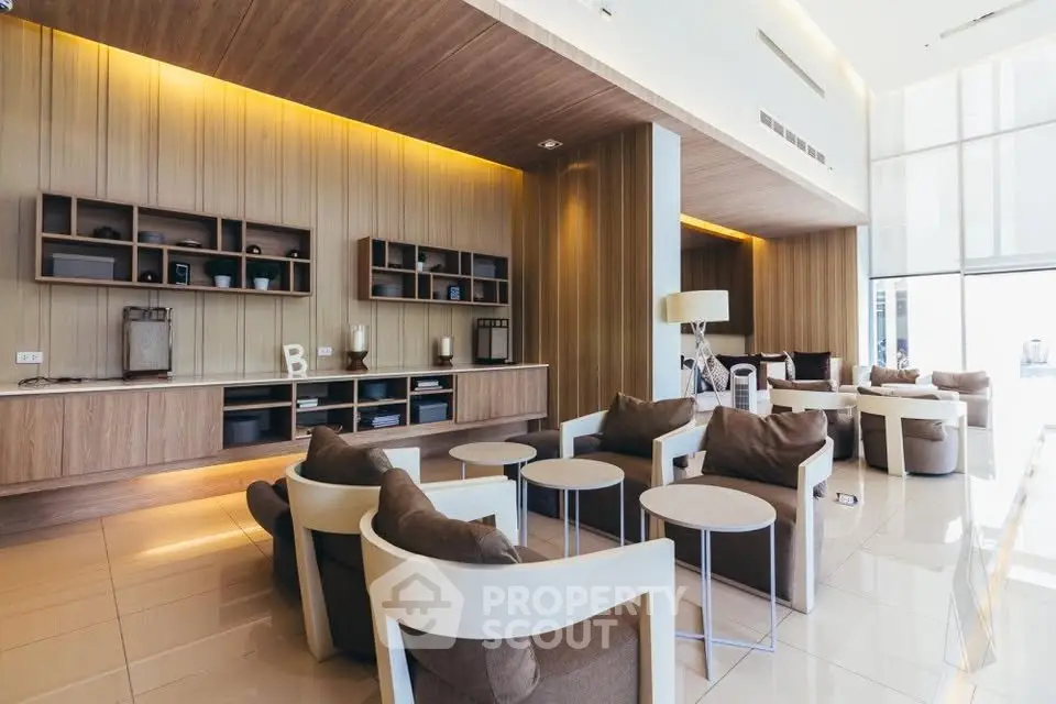 Luxurious modern living room with elegant furniture and high ceilings