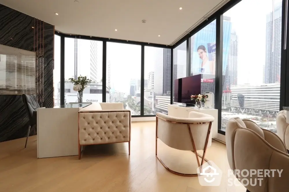 Luxurious modern living room with panoramic city views and elegant furnishings.