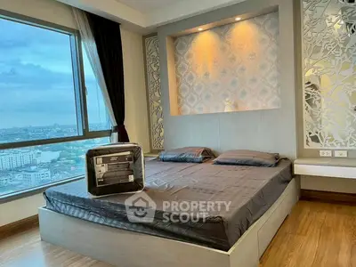 Luxurious bedroom with stunning city view and elegant decor