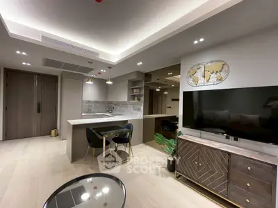 Modern open-plan living room with stylish kitchen and elegant decor