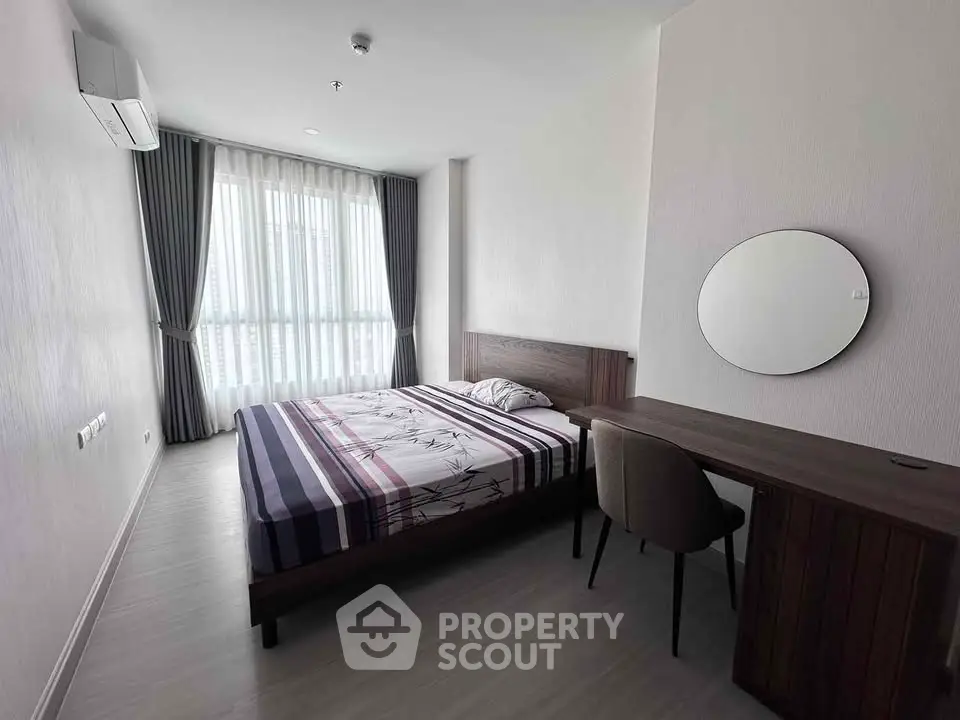 Modern minimalist bedroom with natural light and stylish furniture