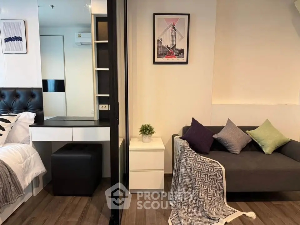 Modern studio apartment with stylish decor and cozy living area