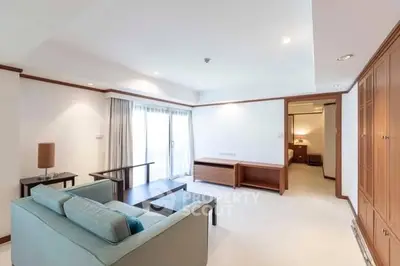 Spacious living room with modern furniture and natural light