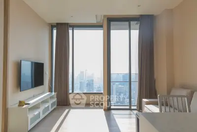Modern living room with city view and large windows
