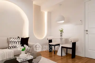 Modern living room with stylish lighting and cozy seating area