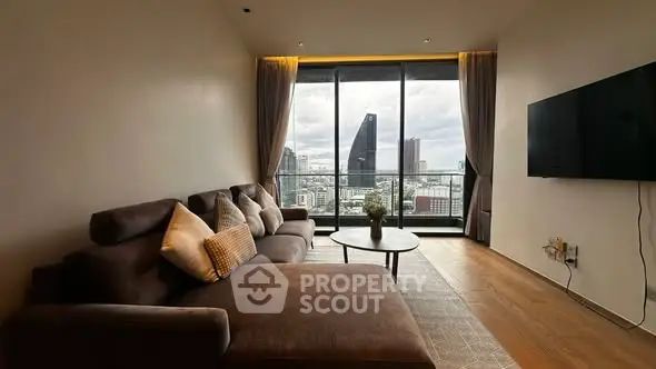Spacious living room with stunning city view and modern decor