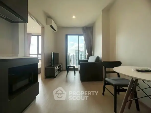 Modern living room with balcony view in a stylish apartment