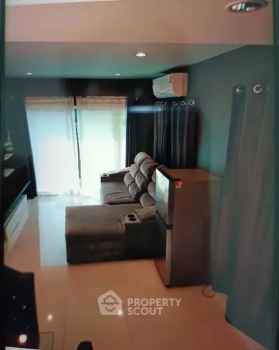 Cozy living room with modern sofa and natural light