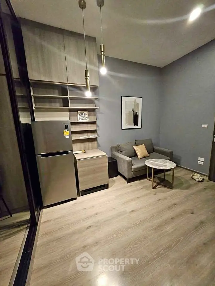 Modern living room with sleek furniture and stylish lighting