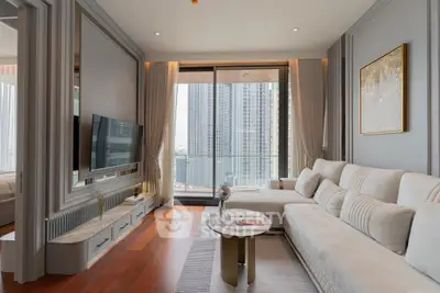 Luxurious living room with modern decor and city view balcony