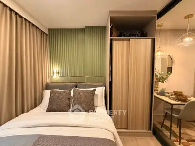 Cozy bedroom with modern decor, built-in wardrobe, and elegant lighting, perfect for urban living.