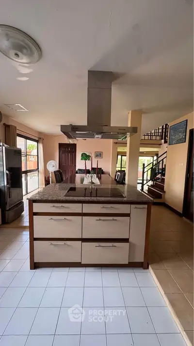 Spacious kitchen with modern island and open layout in a stylish home