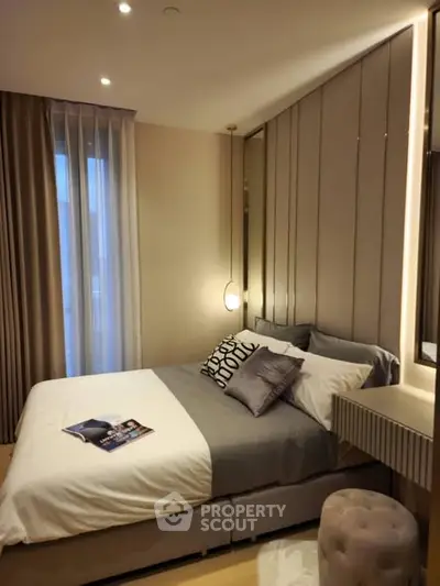 Luxurious modern bedroom with elegant lighting and plush bedding