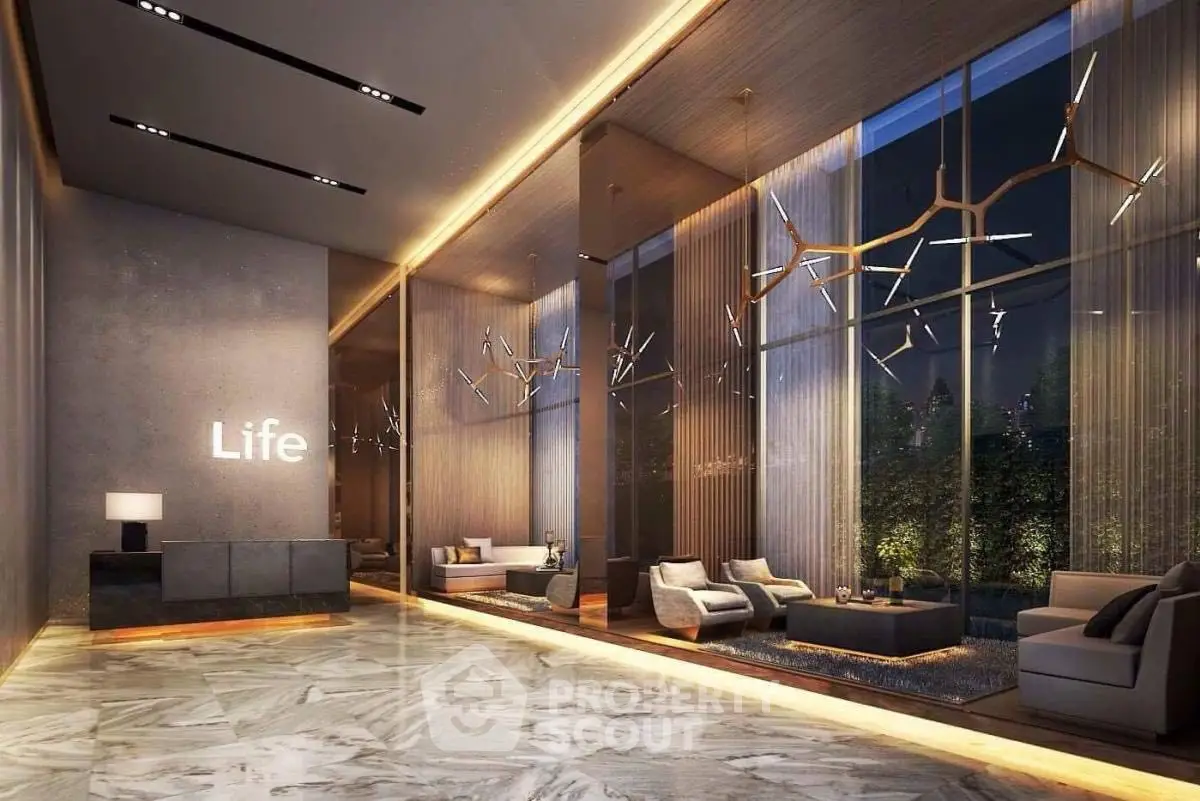 Luxurious modern lobby with elegant lighting and stylish seating area, perfect for upscale living.