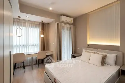 Modern bedroom with stylish decor and natural light