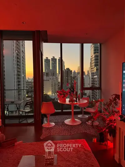 Stunning city view from modern living room with chic decor and sunset ambiance.