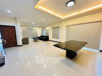 Spacious modern living room with elegant marble table and sleek design