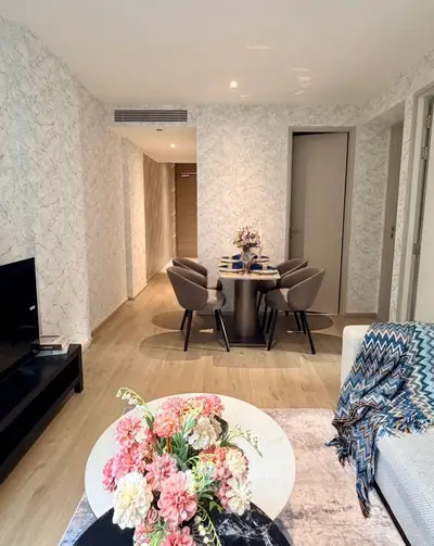 Stylish living room with elegant dining area and modern decor