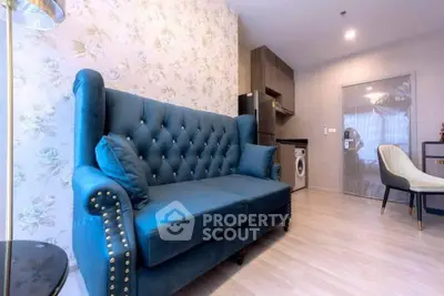 Stylish living room with elegant blue sofa and modern decor