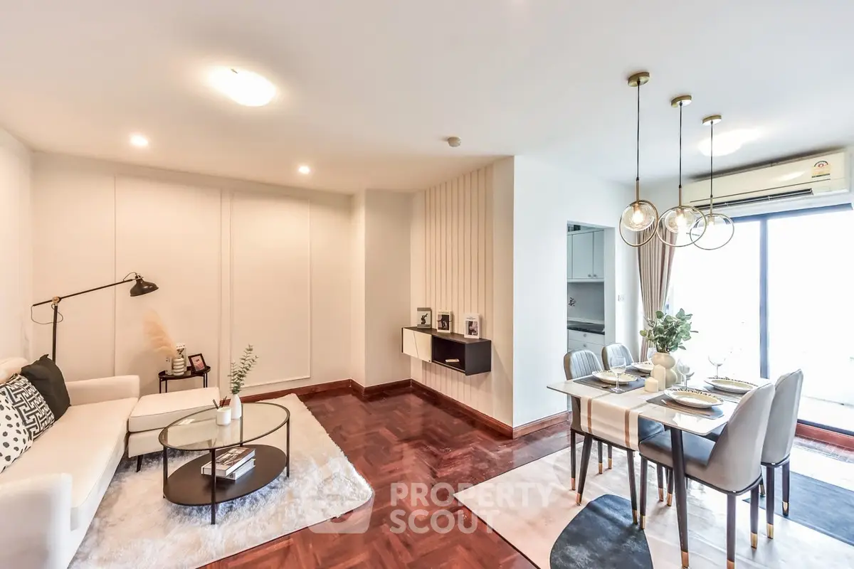 Spacious modern living room with elegant dining area and stylish decor