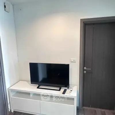 Modern living room with sleek TV setup and minimalist design
