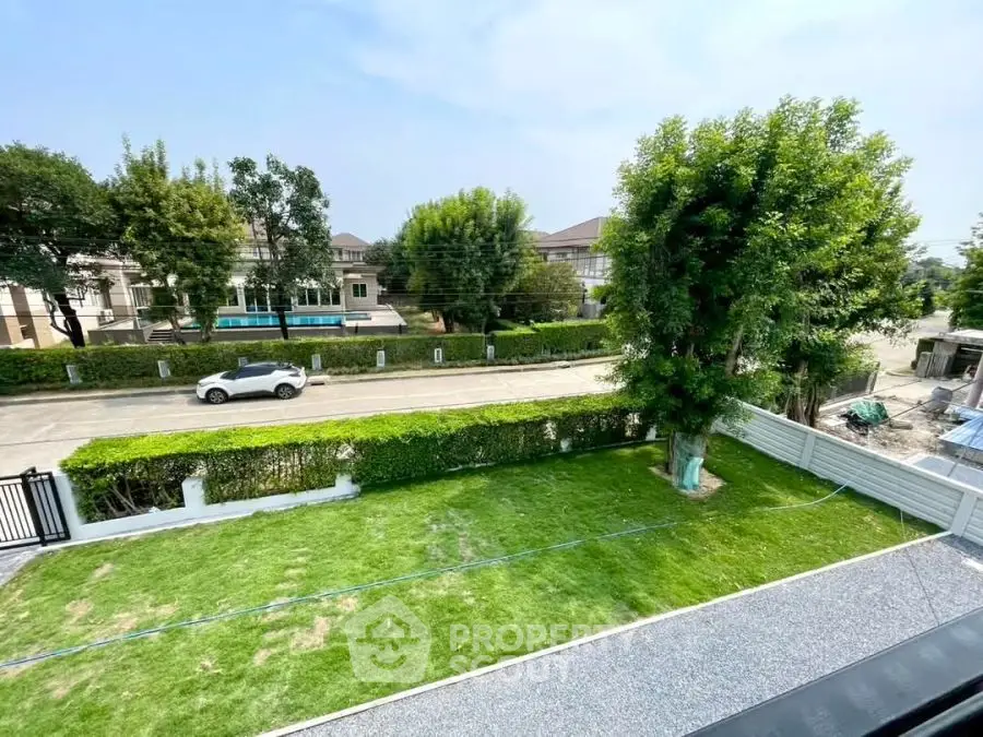 Spacious garden view from balcony in a serene neighborhood