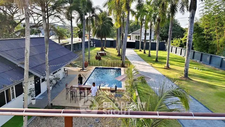 Luxurious property with pool and lush garden, perfect for relaxation and entertainment.