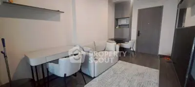 Modern living room with sleek furniture and neutral tones, perfect for urban living.