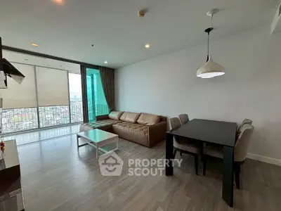 Spacious modern living room with city view and elegant furnishings