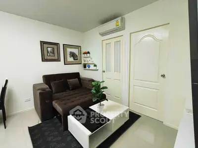 Cozy living room with modern decor and air conditioning