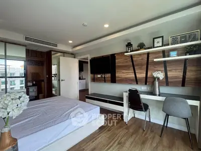 Modern bedroom with stylish decor and wooden accents in a contemporary apartment