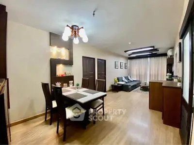 Spacious living room with elegant dining area and modern decor