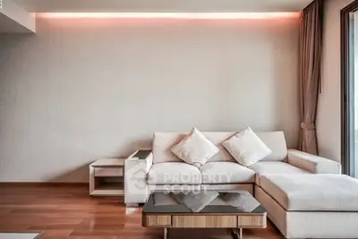 Modern living room with elegant sofa and ambient lighting