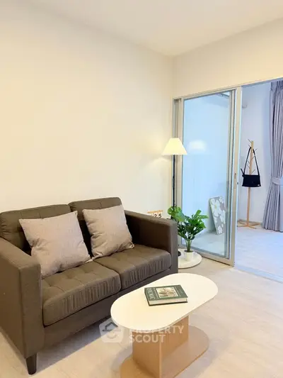 Modern living room with cozy sofa and stylish decor