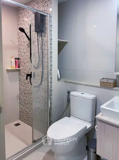 Modern bathroom with sleek shower and contemporary fixtures