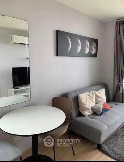 Modern living room with stylish decor and cozy seating area