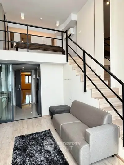 Modern loft apartment with mezzanine bedroom and stylish living area