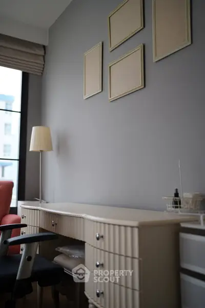 Modern study room with elegant desk and large window view