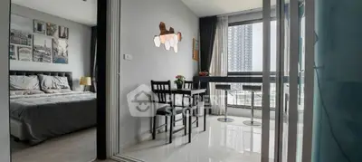Modern condo with sleek interior, featuring a cozy bedroom and stylish dining area with city view.