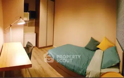 Cozy bedroom with modern decor and wooden flooring