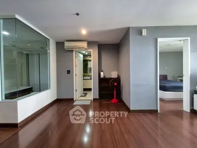 Spacious modern apartment with hardwood floors and sleek design