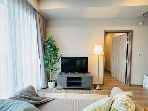 Modern living room with stylish decor and natural light