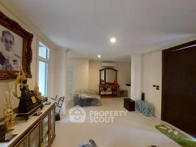 Spacious living room with elegant decor and large window