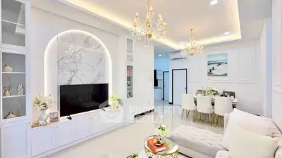Luxurious living room with elegant chandeliers and modern decor