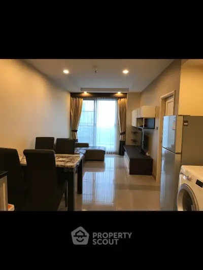 Modern living room with dining area and large window in stylish apartment