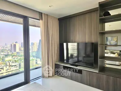 Luxurious living room with city view and modern entertainment center