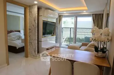 Modern living room with elegant decor and balcony view