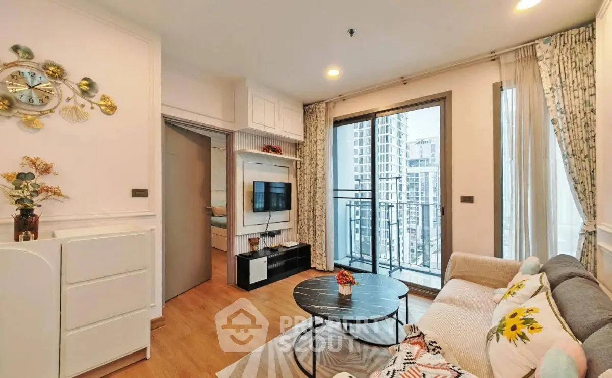 Modern living room with stylish decor and balcony view in urban apartment